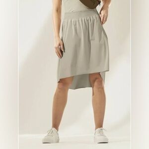 Athleta Cosmic High‎ Low Skirt Beige Size XXS Pockets Athletic Travel Activewear